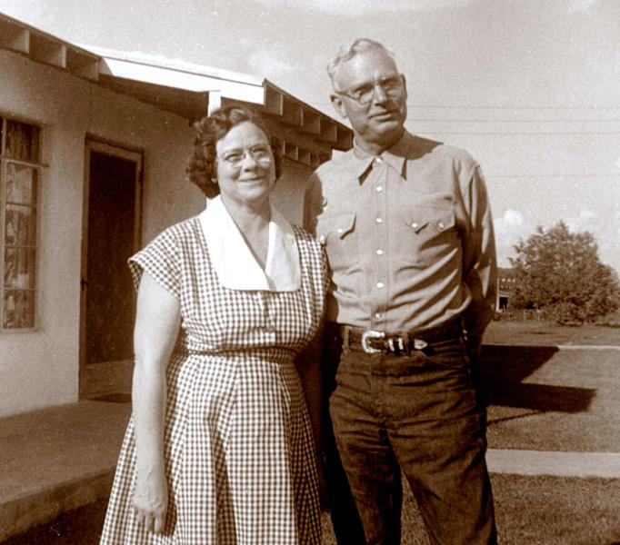 1957 Mildred and George in front ot their Ruidoso house